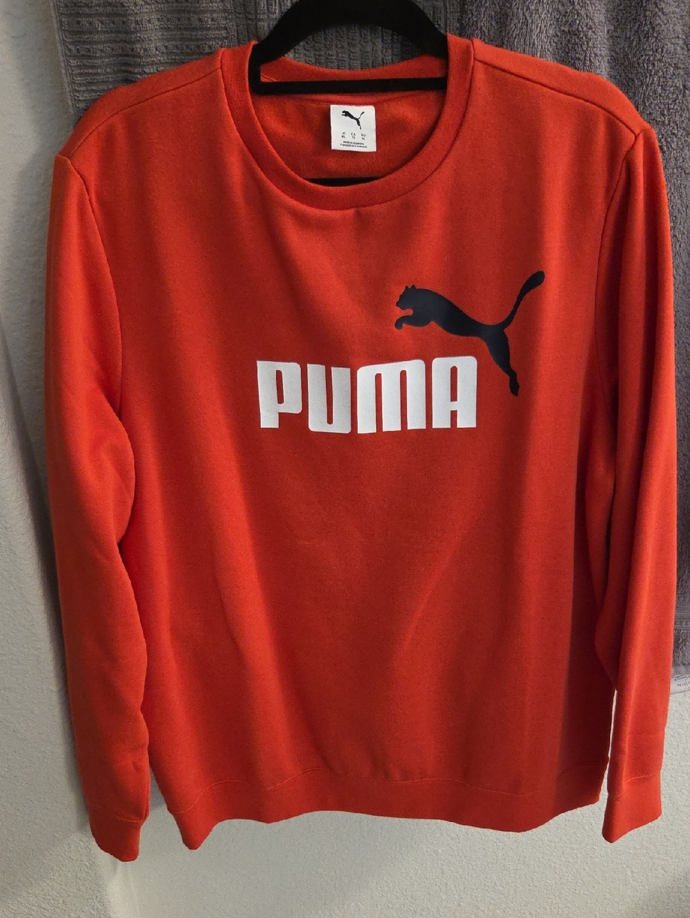 Puma Men's Crewneck Sweatshirt in Orange with Black Logo